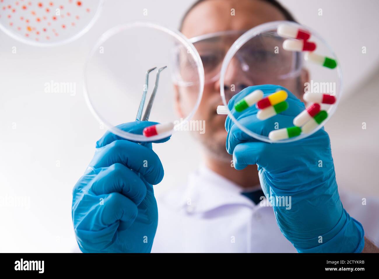 Young pharmacist working in the lab Stock Photo Alamy