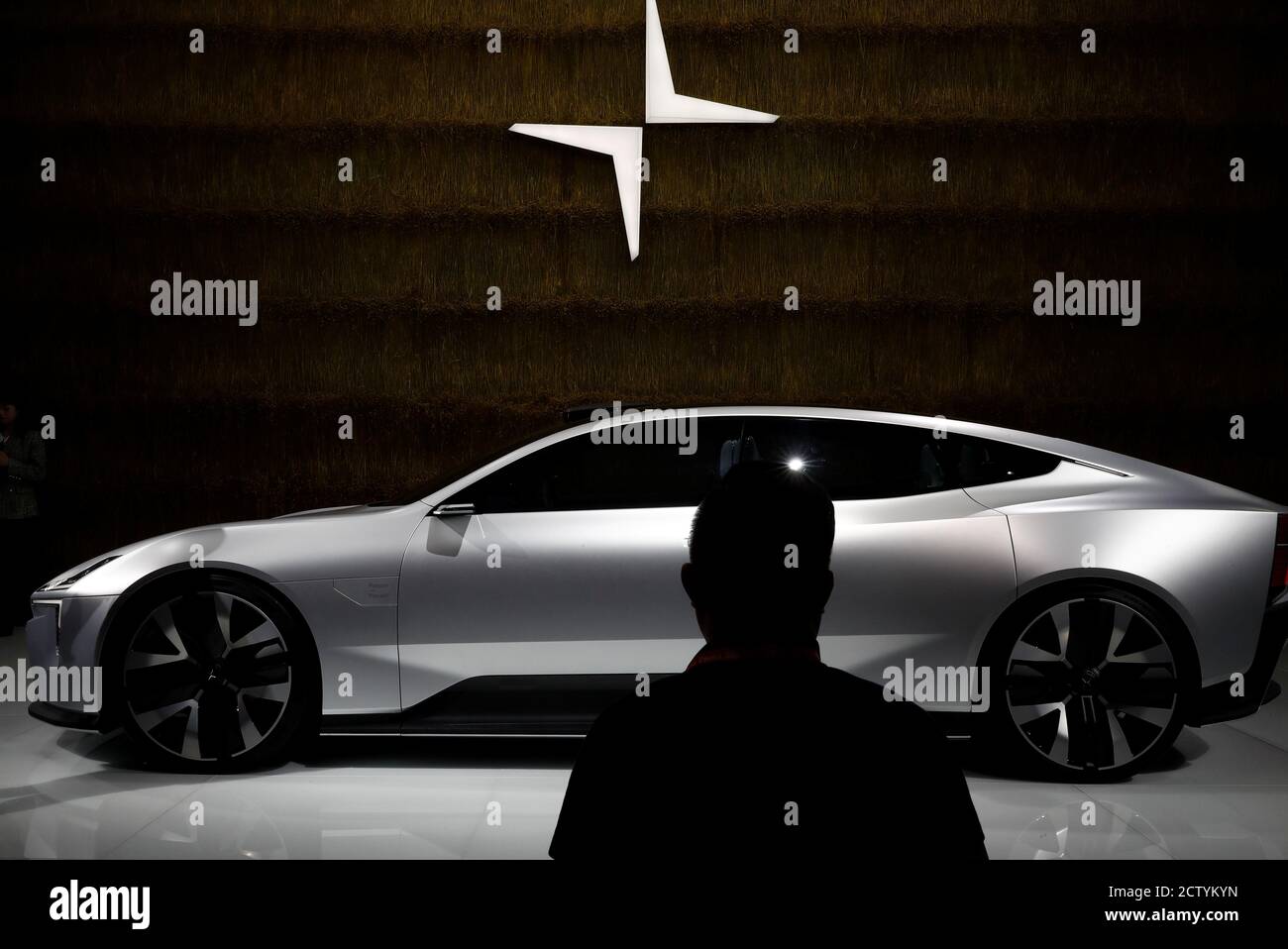 A man looks at a Polestar Precept car at the Beijing International Automotive Exhibition, or Auto China show, in Beijing, China September 26, 2020. REUTERS/Thomas Peter Stock Photo