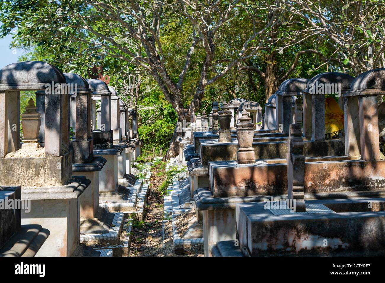 Limau-Limauan, Sabah, Malaysia: Suluk-Bajau tombs with their conspicious stone baldachins at the old islam cemetery of Limau-Limauan Stock Photo