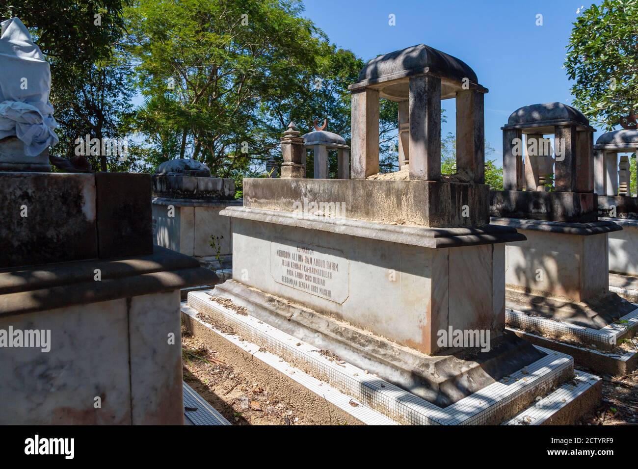 Limau-Limauan, Sabah, Malaysia: Suluk-Bajau tombs with their conspicious stone baldachins at the old islam cemetery of Limau-Limauan Stock Photo
