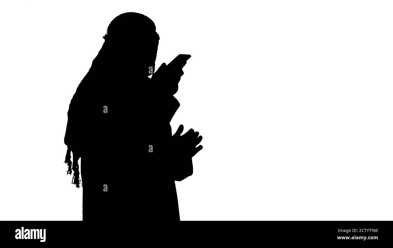 Arabian businessman recording voice message or using voice digit Stock Photo