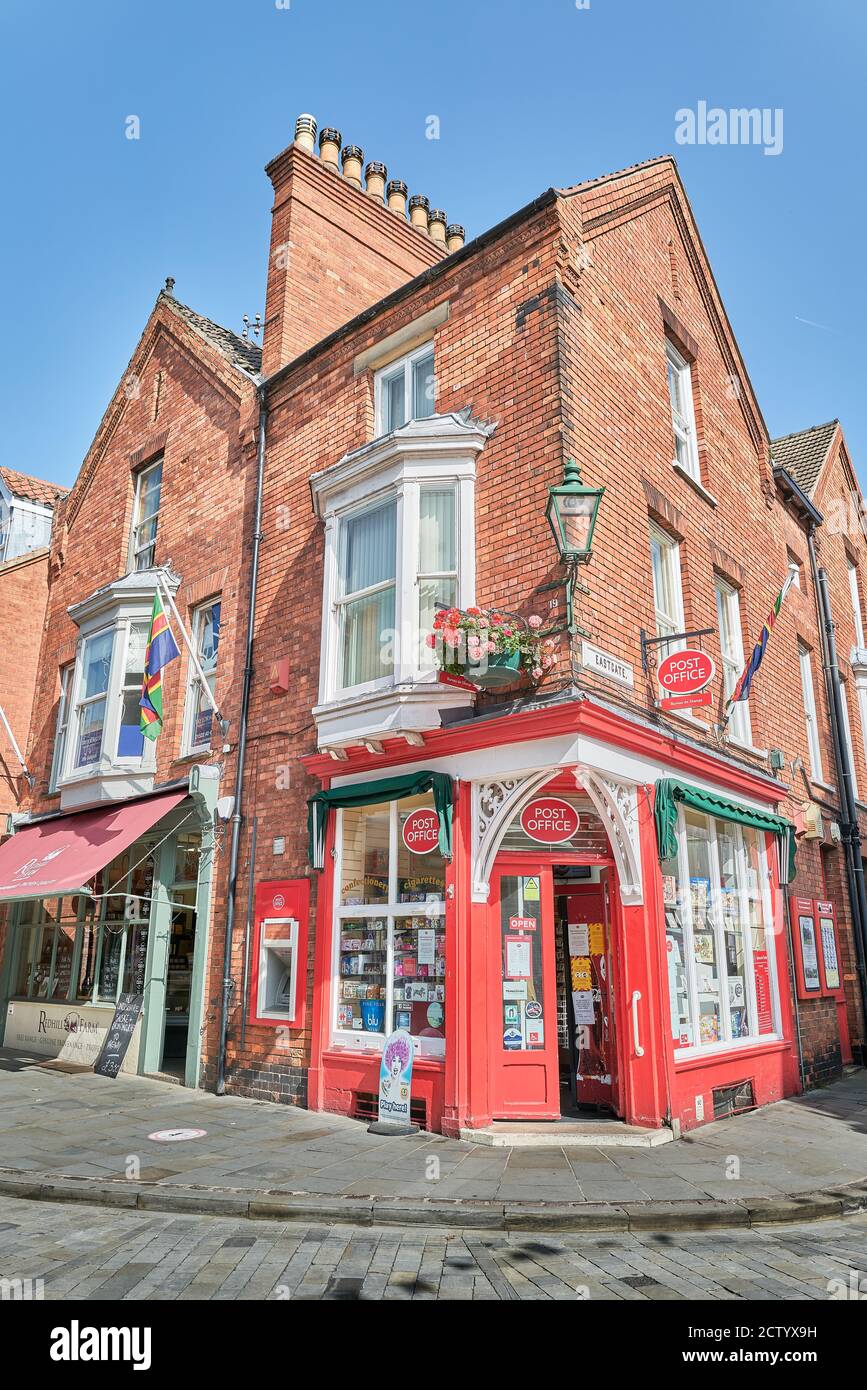 The post office corner shop at the junction of Eastgate and Bailgate