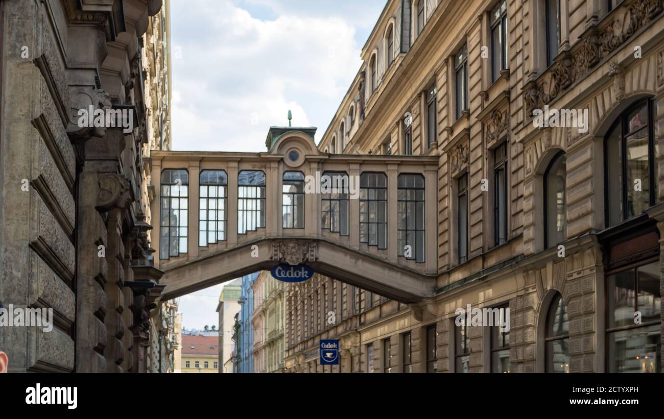 PRAGUE,  CZECH REPUBLIC - JULY 18, 2019:  Exterior view of footbridge crossing between buildings in Nekazanka street (architect Osvald Polívka) Stock Photo