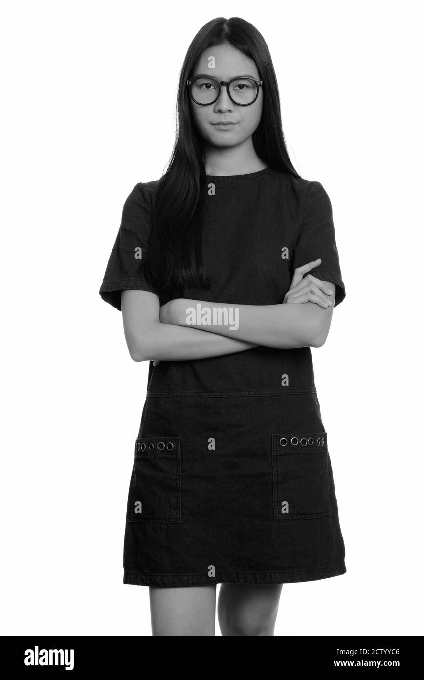 Young beautiful Asian teenage girl looking angry Stock Photo