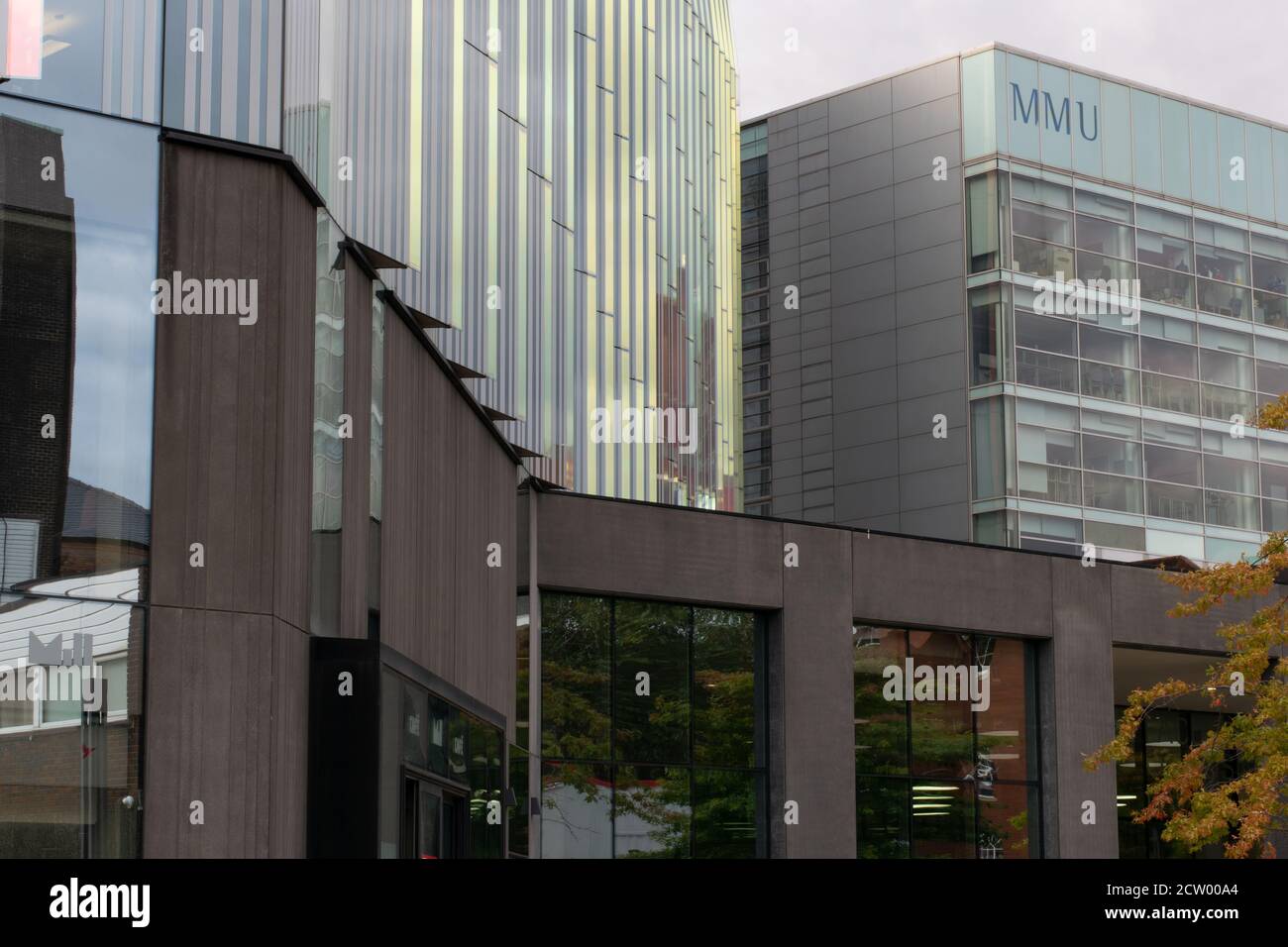 Manchester Metropolitan University business school building and student hub  with MMU logo. Manchester UK. Stock Photo