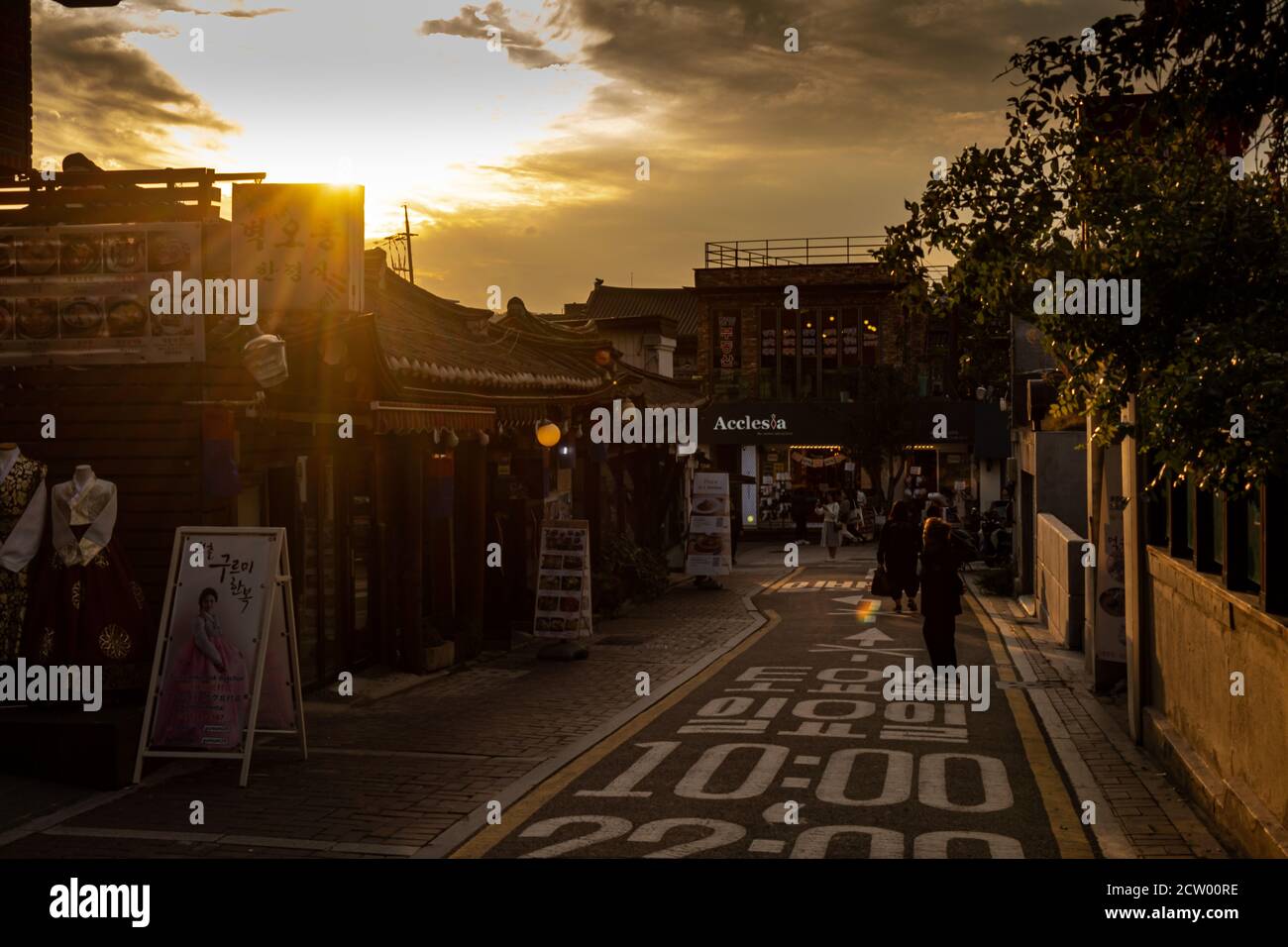 Seoul, South Korea - October 19th 2017: A small street and shops in Seoul at sunset at Bukchon Hanok Village, South Korea Stock Photo