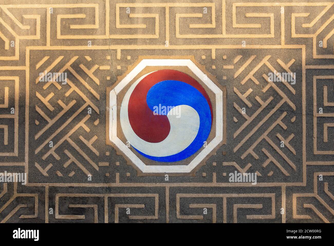 Seoul, South Korea - October 19th 2017: A red, white and blue Taegeuk on a wall, a traditional Korean symbol, at Bukchon Hanok Village, Seoul, South K Stock Photo