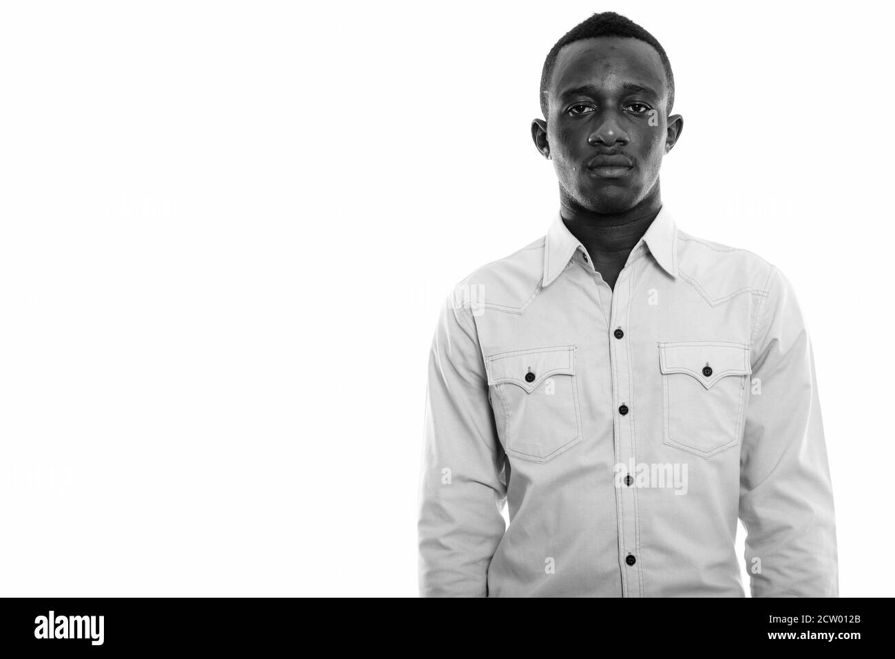 Studio shot of young black African man Stock Photo - Alamy
