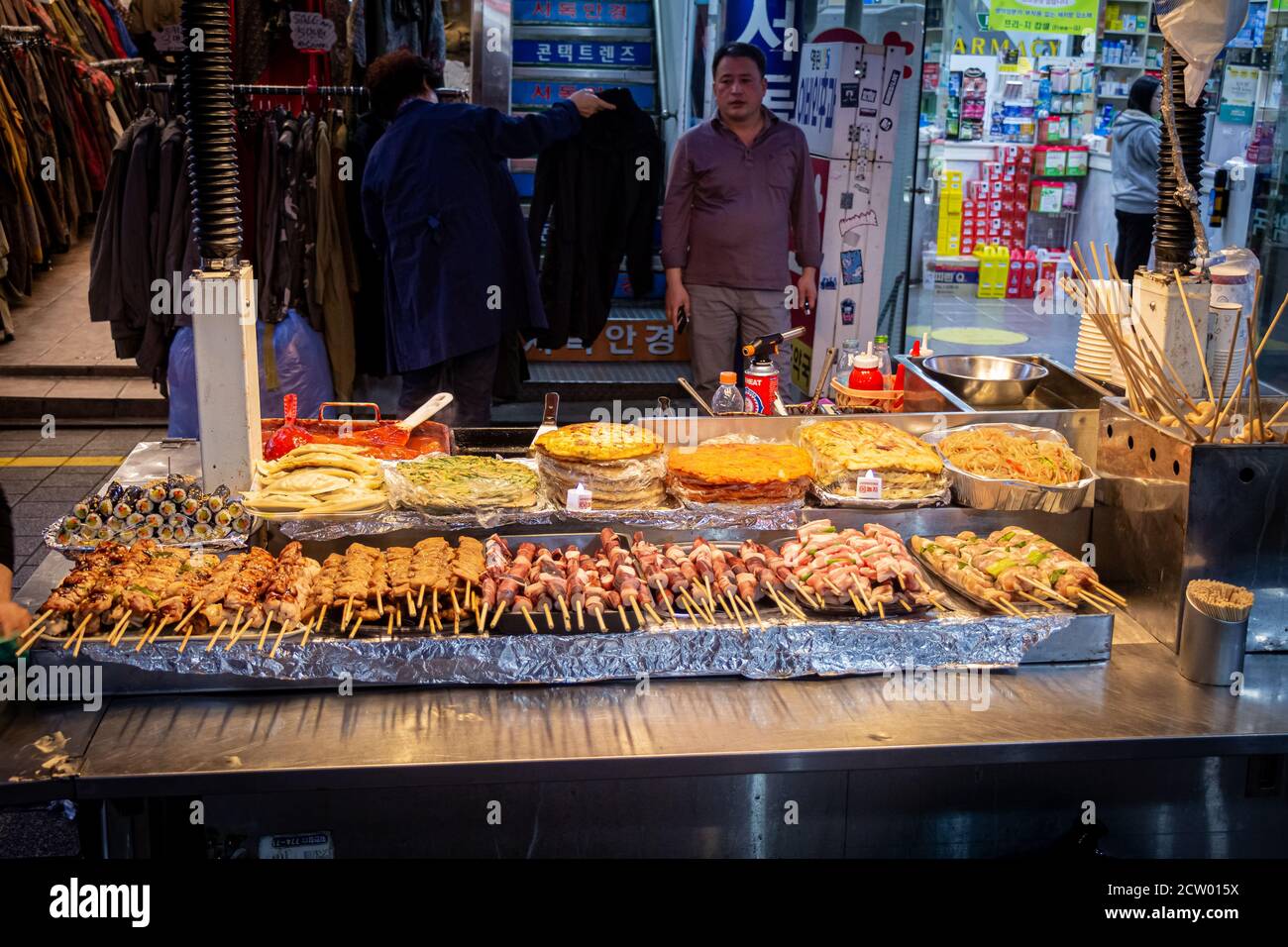 Seoul, South Korea - October 19th 2017: Korean street food stall in the Myeongdong Shopping District at night in Seoul, South Korea Stock Photo