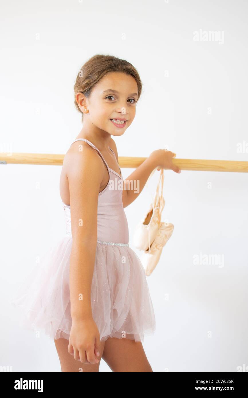 Cute adorable ballerina little girl in pink tutu dance practices ballet  dancing Stock Photo - Alamy