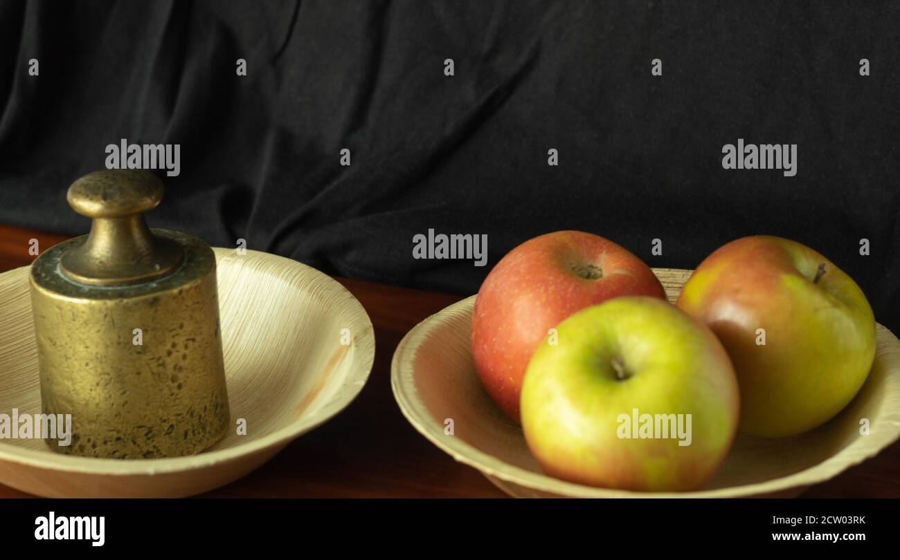 old weight to buy fruits like tasty and fresh apples for good health Stock Photo