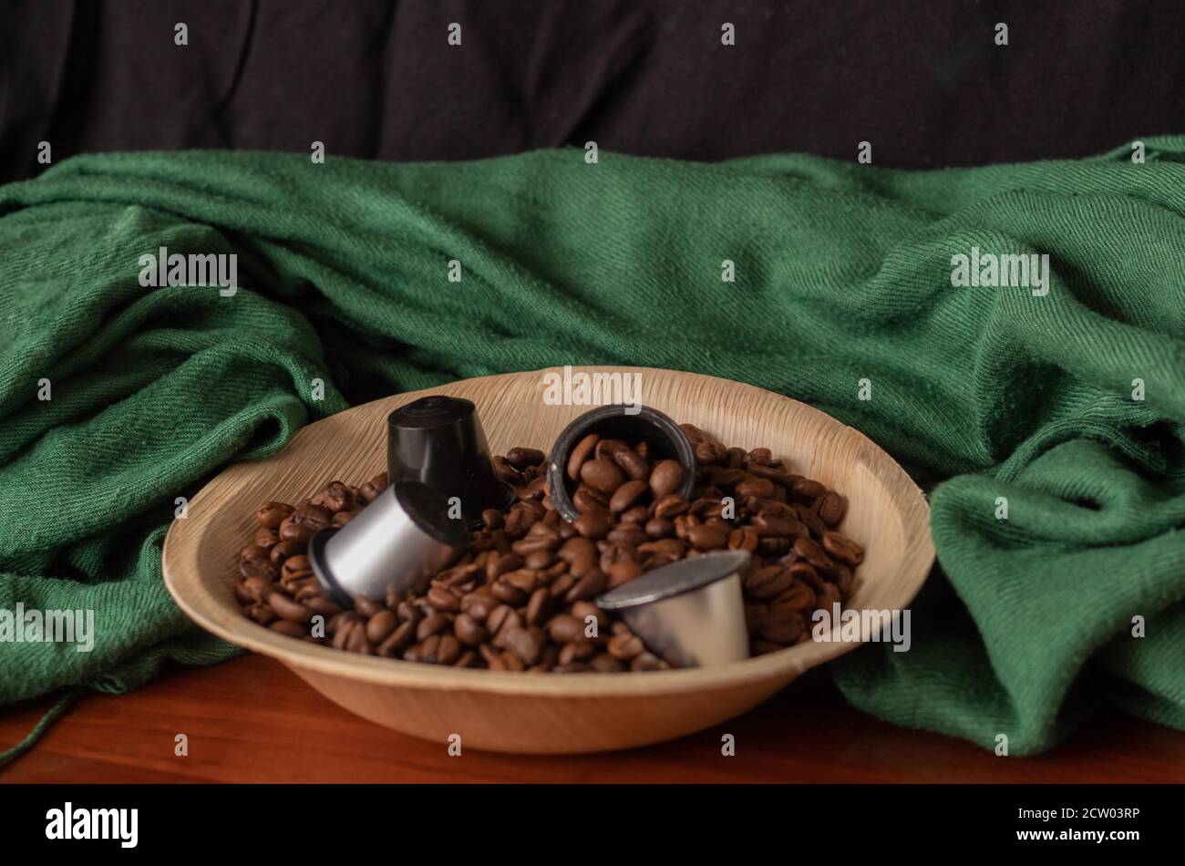 Italian espresso capsules or coffee pods with roasted coffee beans ready for a good day Stock Photo