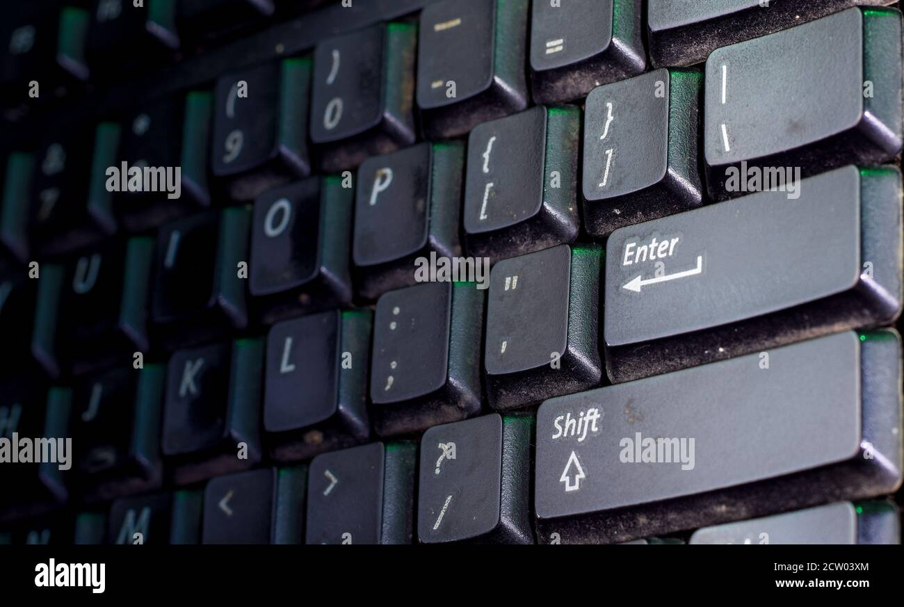 selective focus on enter button of computer keyboard. Stock Photo