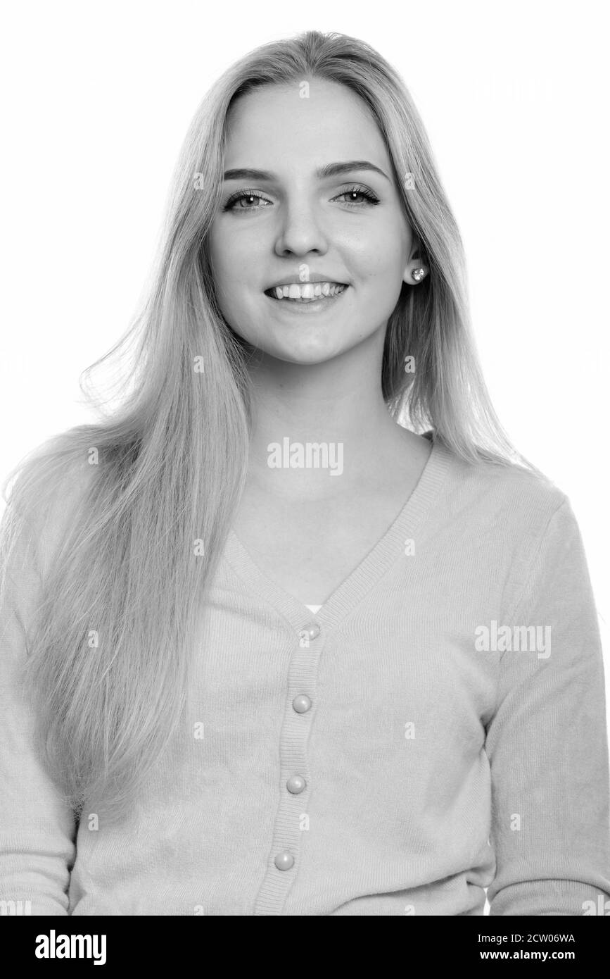 Studio shot of young happy teenage girl smiling Stock Photo - Alamy