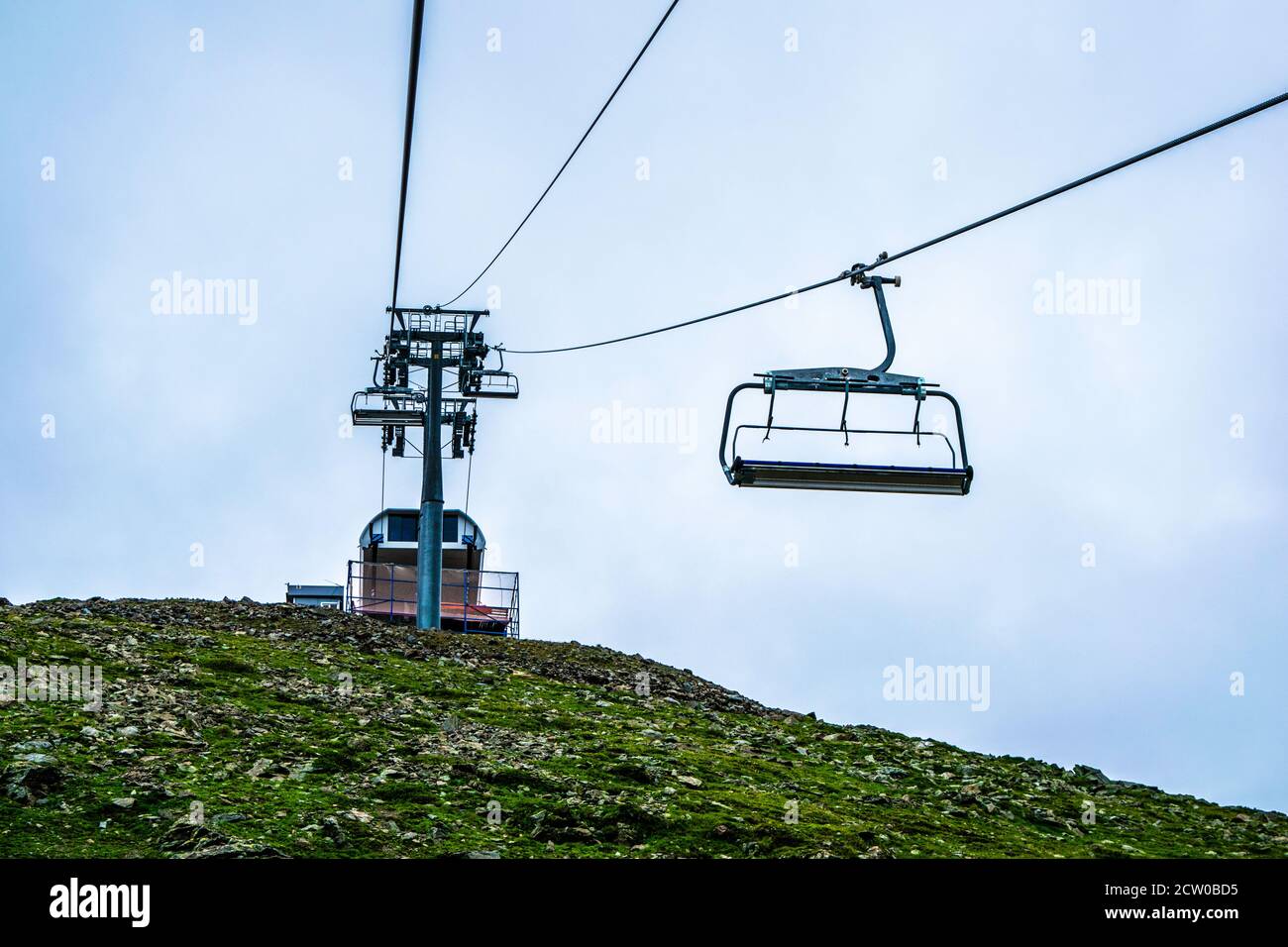 cable car on a mountain slope cable cars running up and down Stock Photo