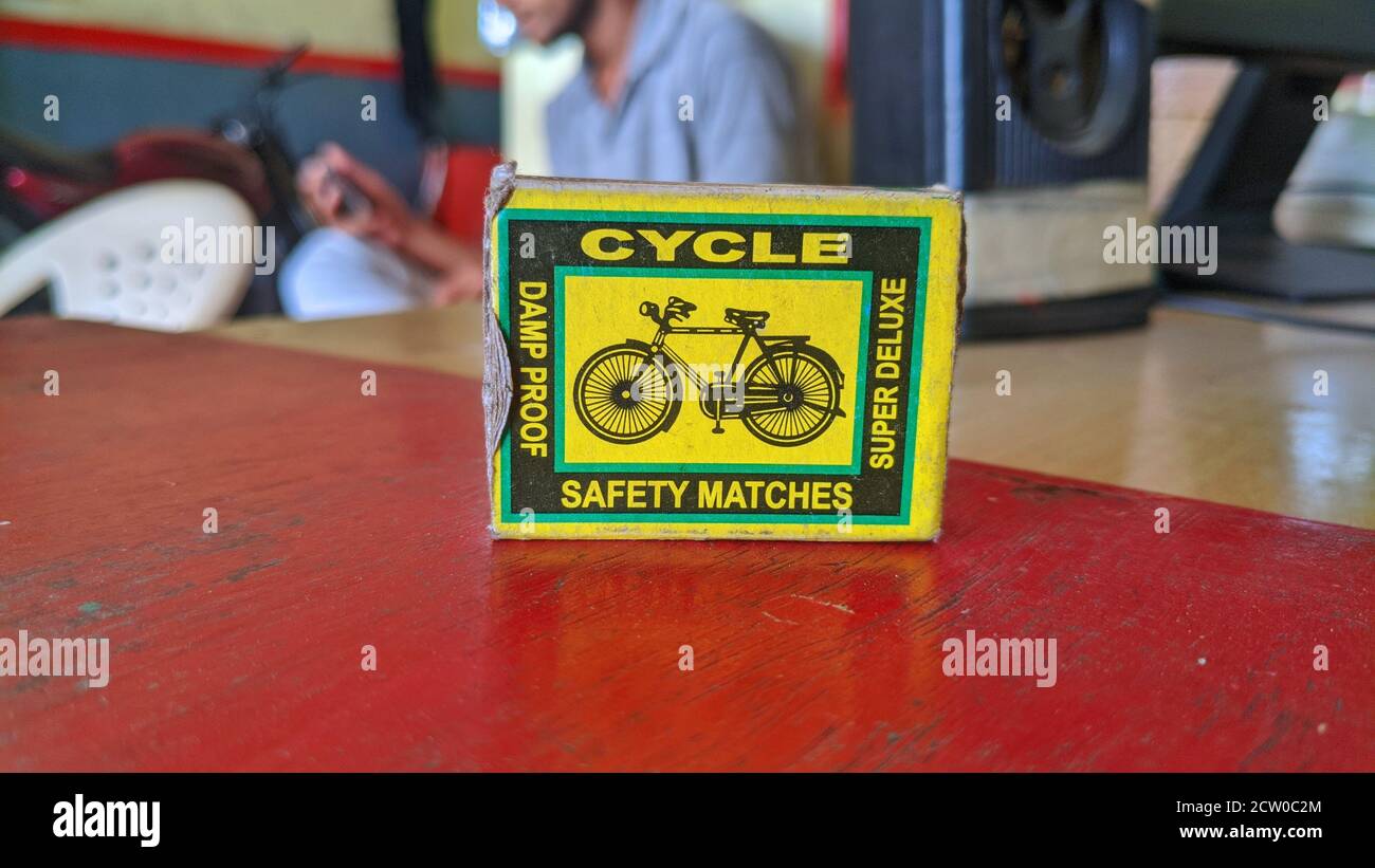 25 September 2020 : Reengus, Jaipur, India : Indian safety matches. Box of Safety Matches on a red wooden table. Stock Photo