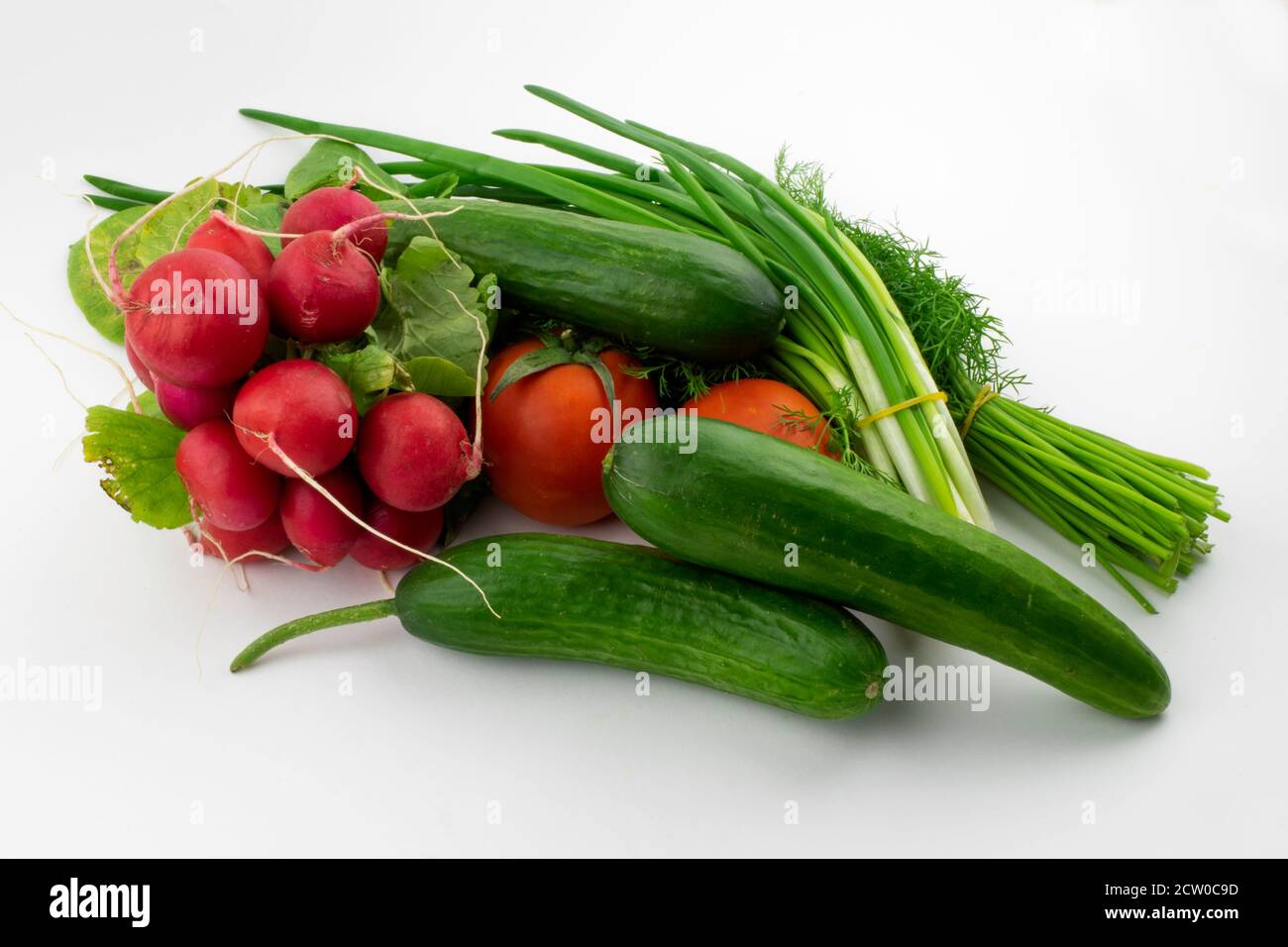 vegetables and greens on a white background close-up Stock Photo - Alamy