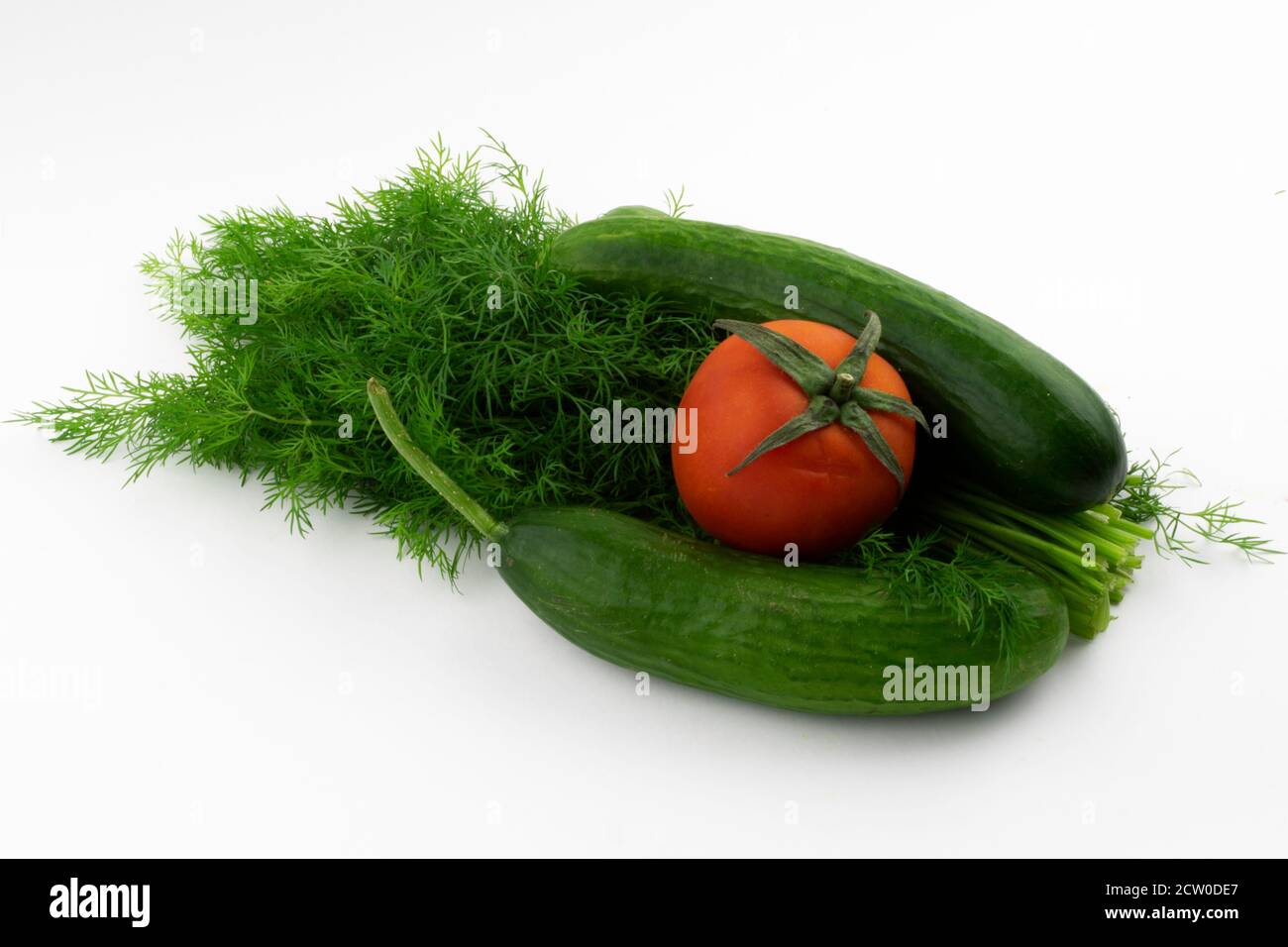 vegetables and greens on a white background close-up Stock Photo - Alamy