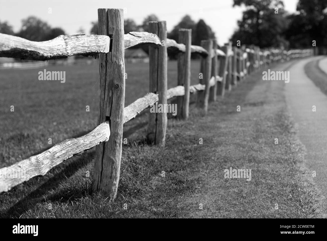 US style slot and post ranch fencing - Withington Hall, Cheshire Stock Photo