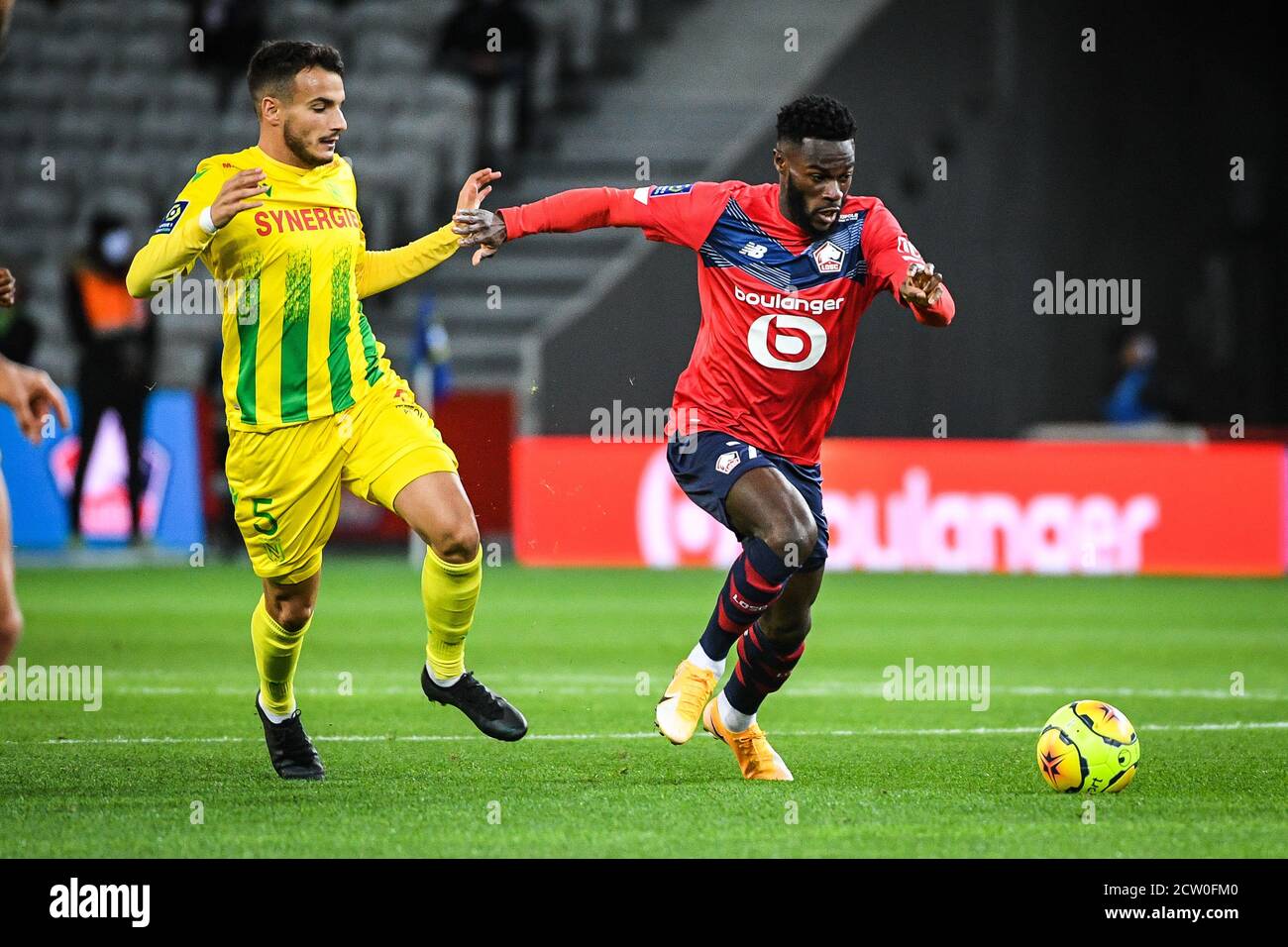 Pedro CHIRIVELLA of FC Nantes and Jonathan BAMBA of Lille during the French  championship Ligue 1 football match between Lille OSC and FC Nantes on Sep  Stock Photo - Alamy