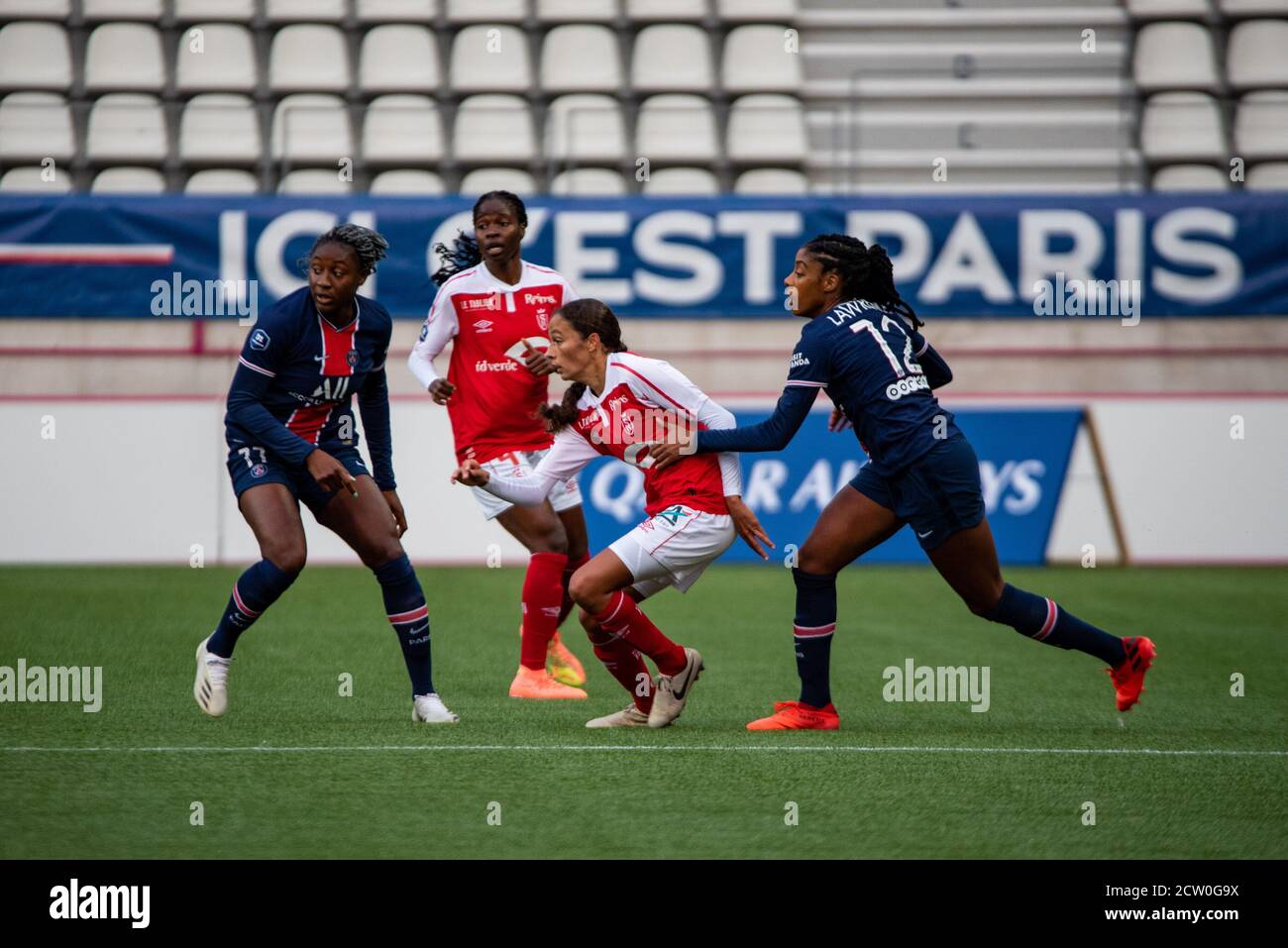 Kadidiatou Diani of Paris Saint Germain, Kessya Bussy of Stade de Reims and Ashley Lawrence of Paris Saint Germain fight for the ball during the Women Stock Photo