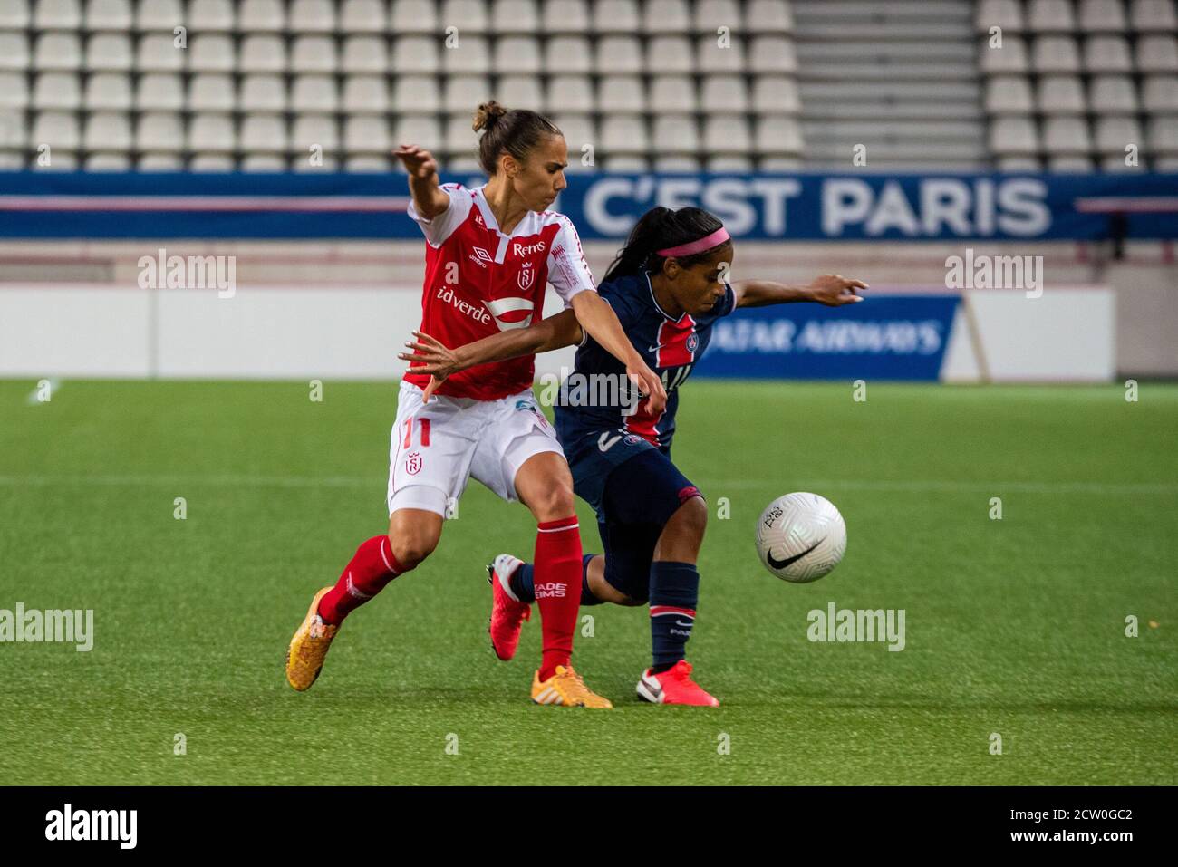 Tanya Romanenko of Stade de Reims and Perle Morroni of Paris Saint Germain fight for the ball during the Women's French championship D1 Arkema footbal Stock Photo