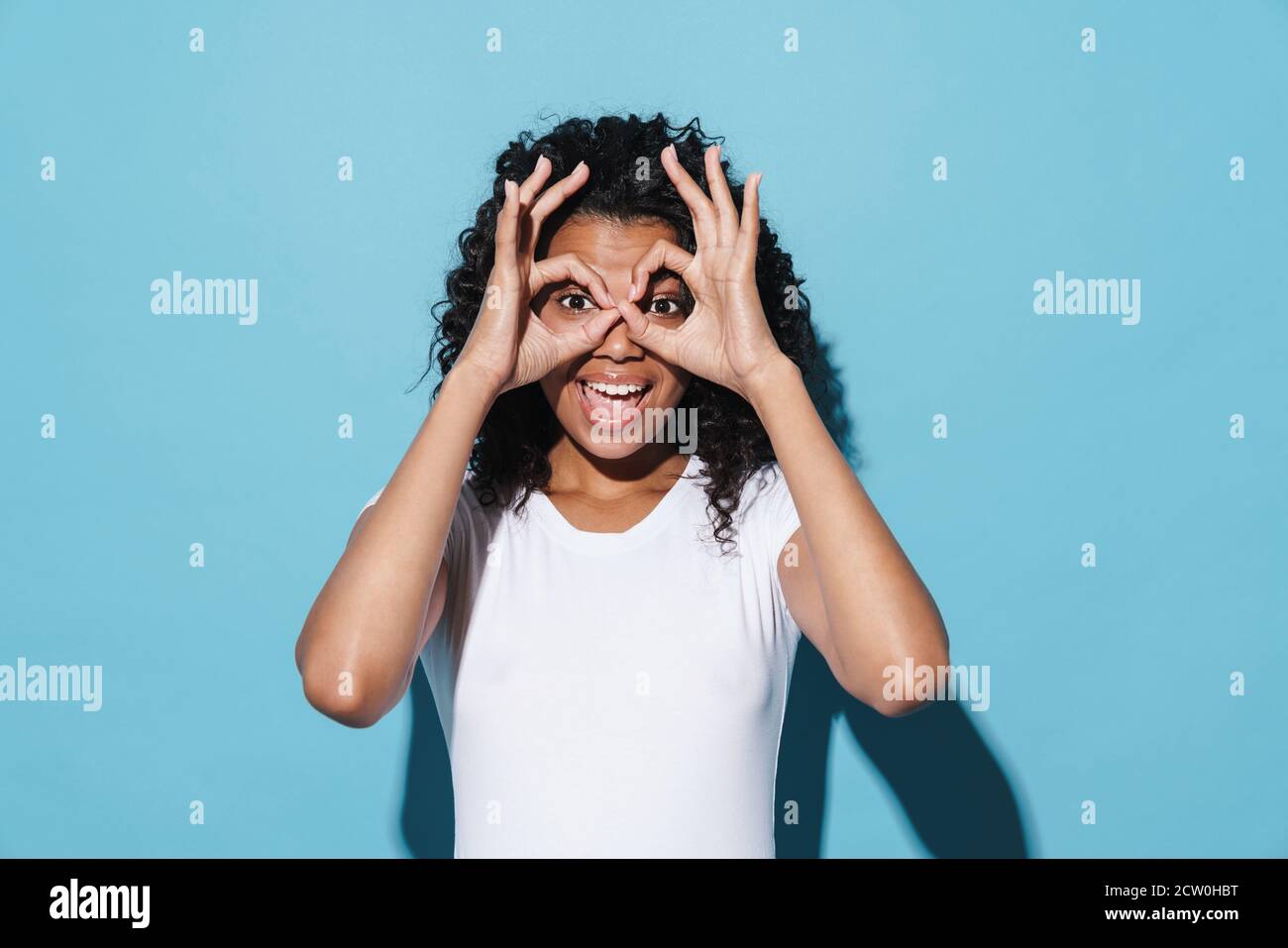 Image of happy african american girl smiling and showing ok sign ...