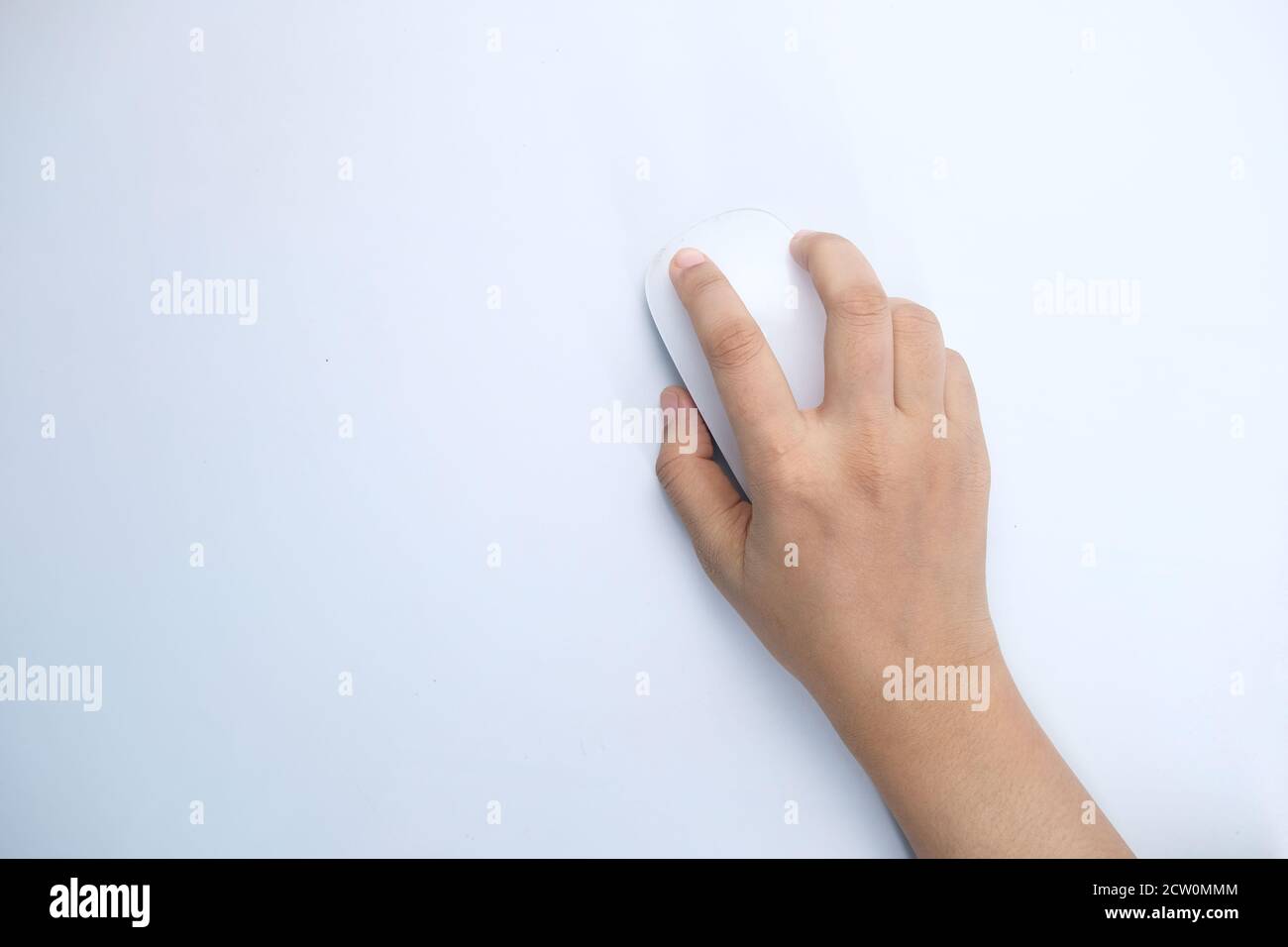 women hand with computer mouse on white background  Stock Photo