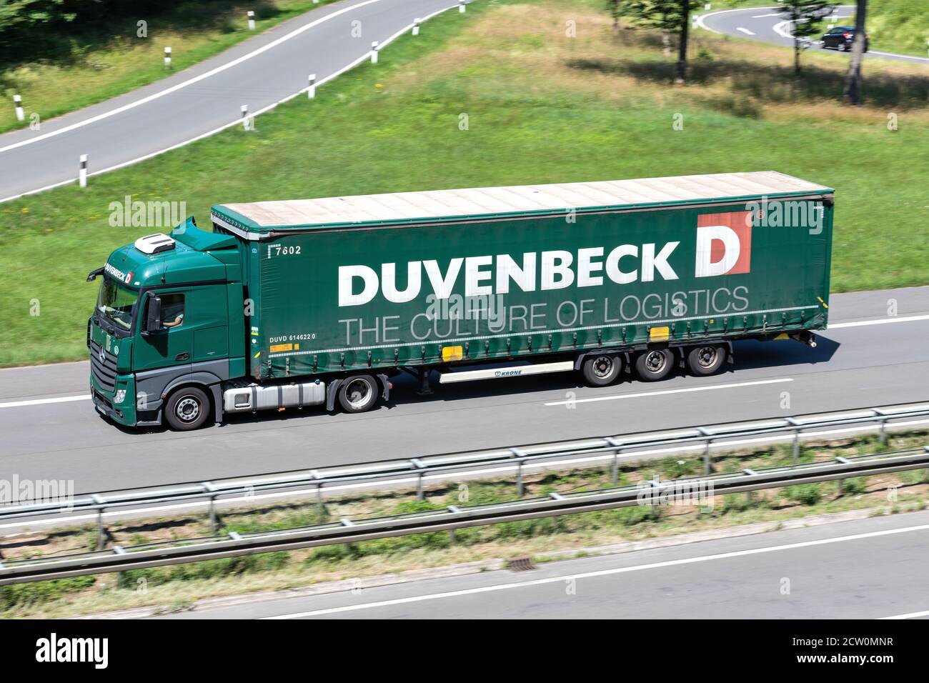 Duvenbeck Mercedes-Benz Actros truck with curtainside trailer on motorway. Stock Photo