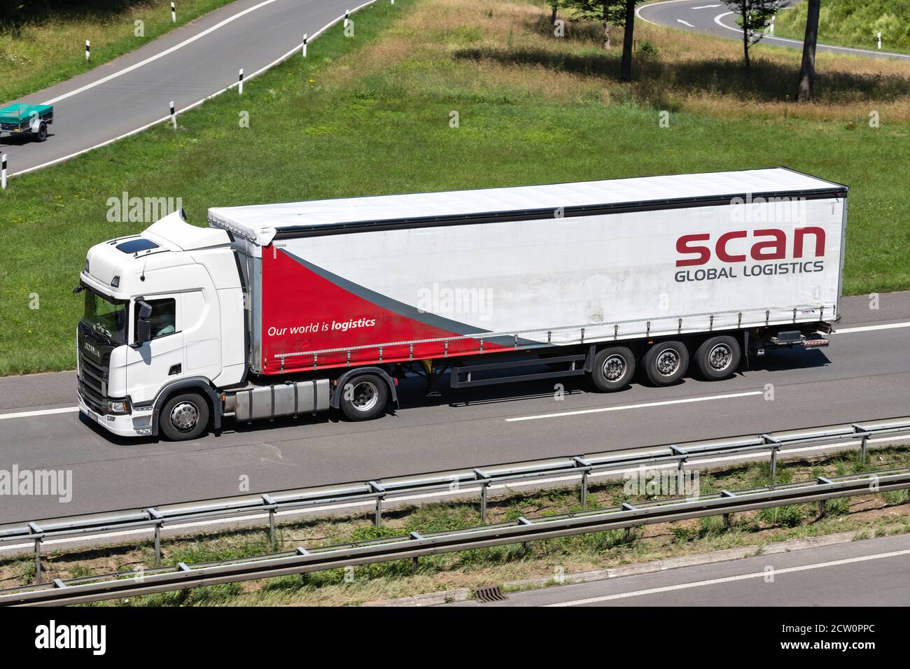 Scania truck with Scan Global Logistics curtainside trailer on motorway  Stock Photo - Alamy