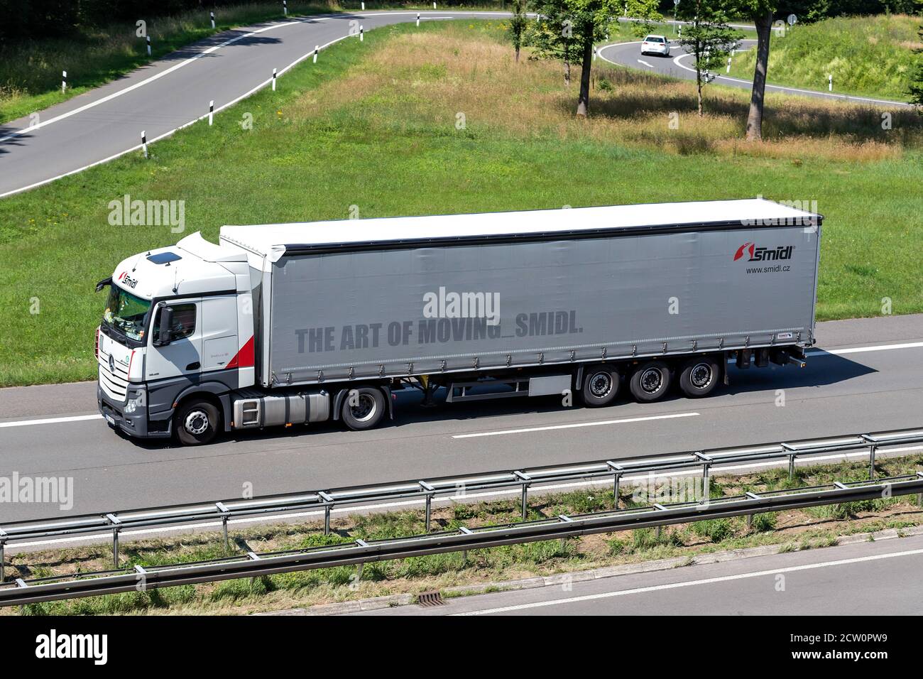 Smidl Mercedes-Benz Actros truck with curtainside trailer on motorway. Stock Photo