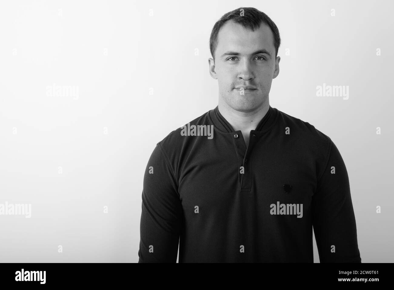 Studio shot of young muscular man against white background Stock Photo ...