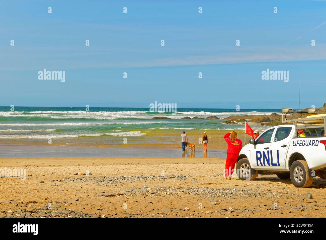 RNLI lifeguard at Gwithian beach, North Cornwall, England. Stock Photo