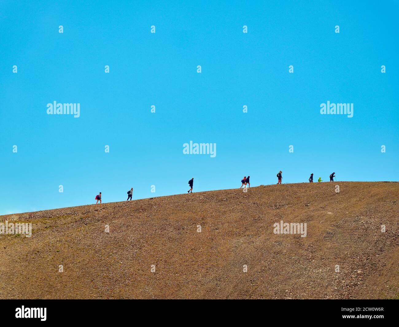 Group of people walking uphill hi-res stock photography and images - Alamy