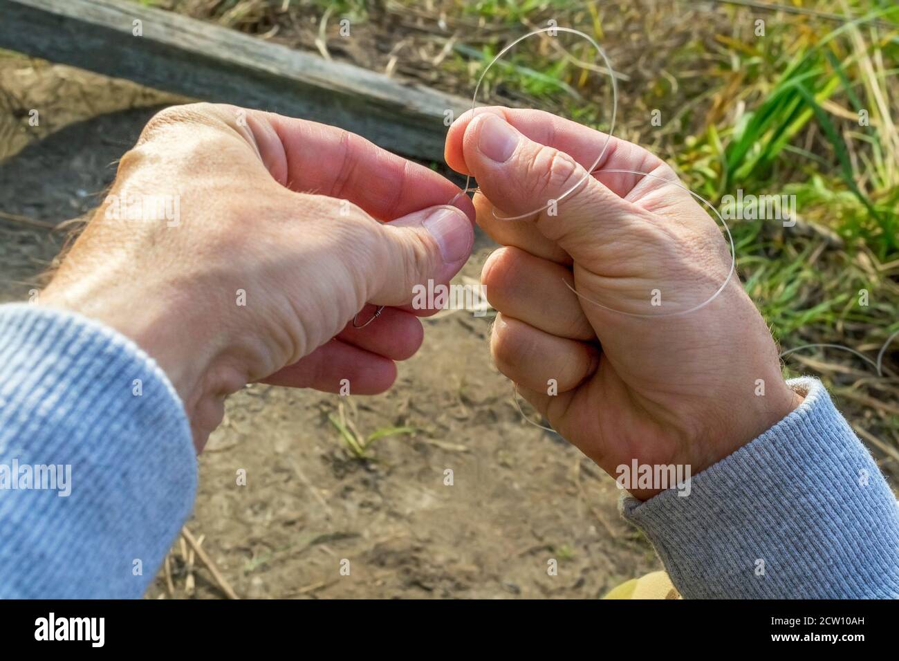 Man hook hi-res stock photography and images - Alamy