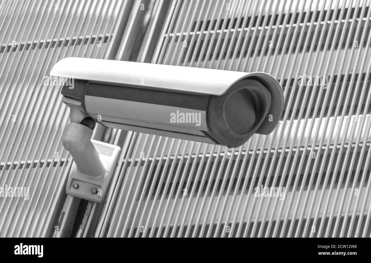 Outdoor modern security surveillance camera in public place Stock Photo
