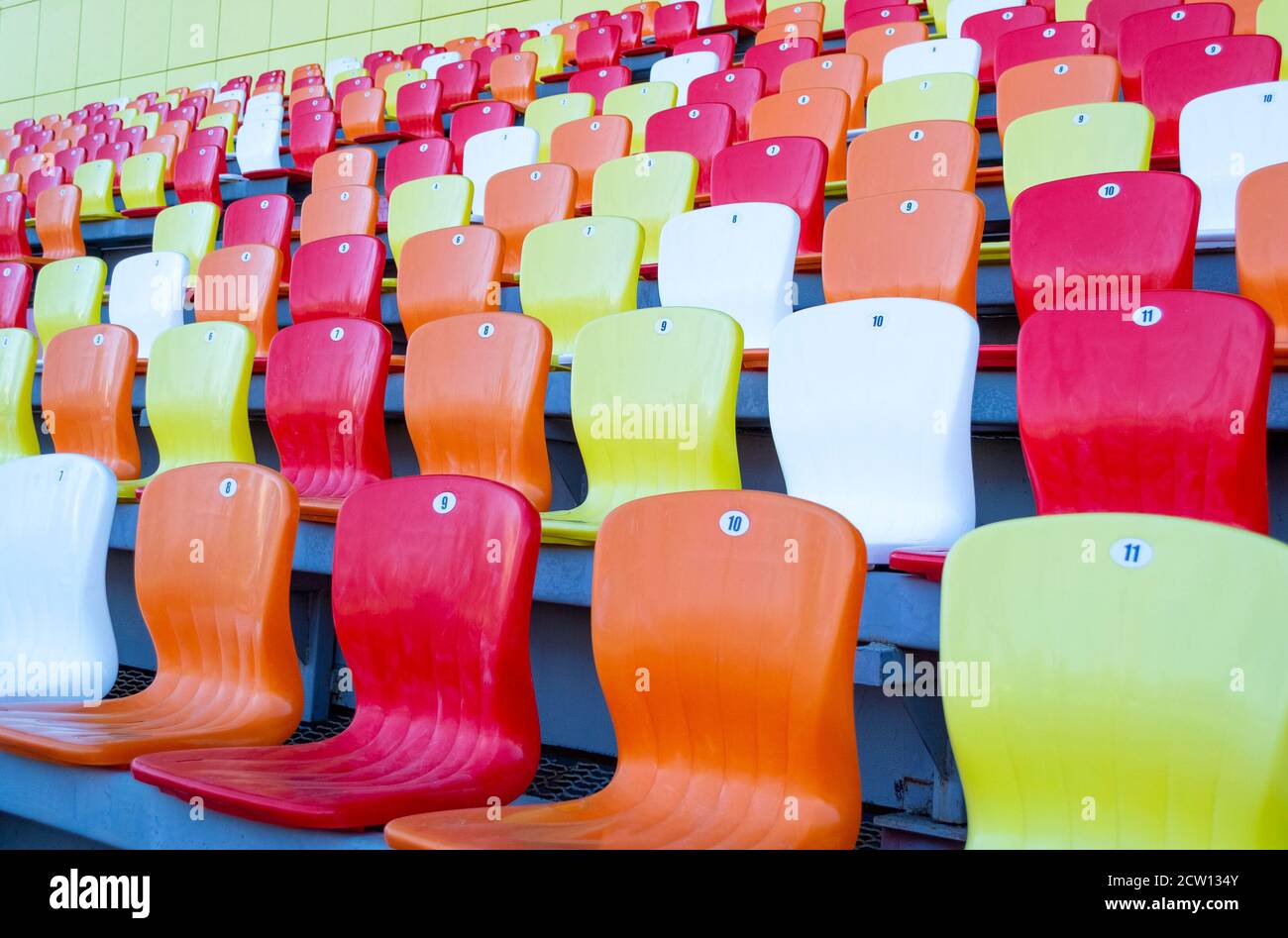 Colored stadium seats in a row side view Stock Photo Alamy