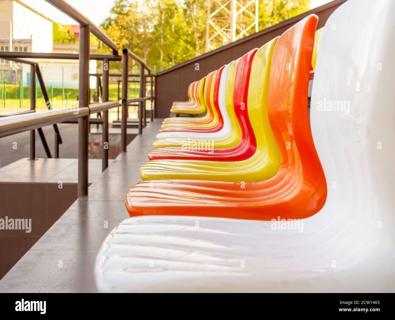 Colored stadium seats in a row side view Stock Photo Alamy