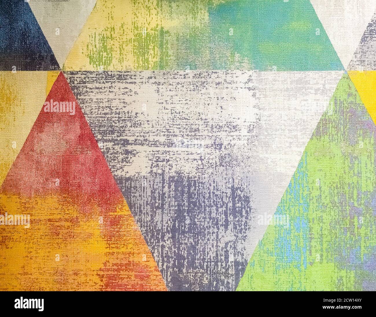 Old colored grunge wallpaper with triangles. Geometric texture Stock Photo