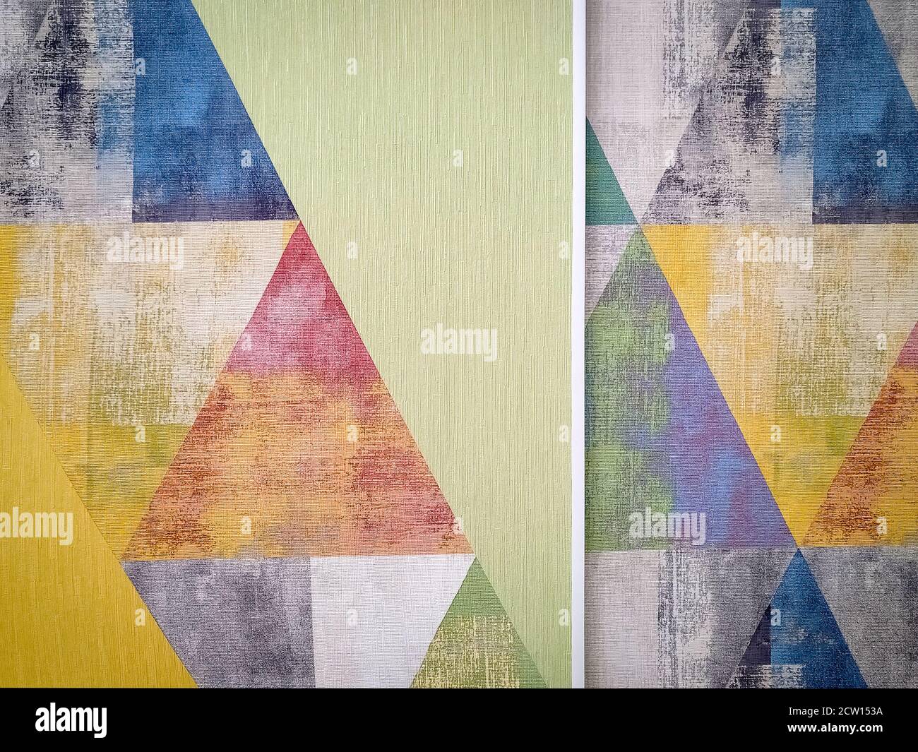 Old colored grunge wallpaper with triangles. Geometric texture Stock Photo