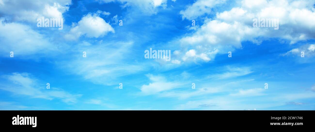 Sunny background, blue sky with white cumulus clouds Stock Photo - Alamy
