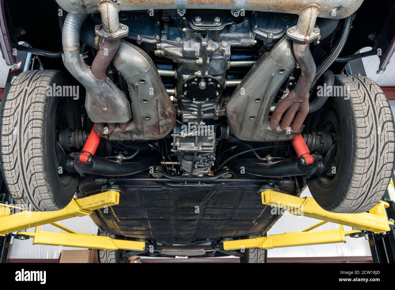 Undercarriage of fancy sports car show engineered design for speed and aerodynamics. Stock Photo