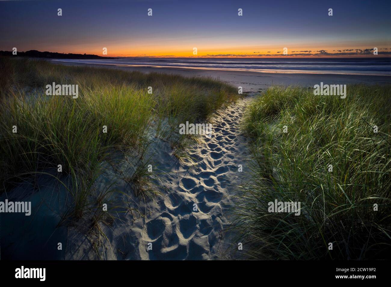 Light on beach footpath at sunrise, Narragansett, Rhode Island USA Stock Photo