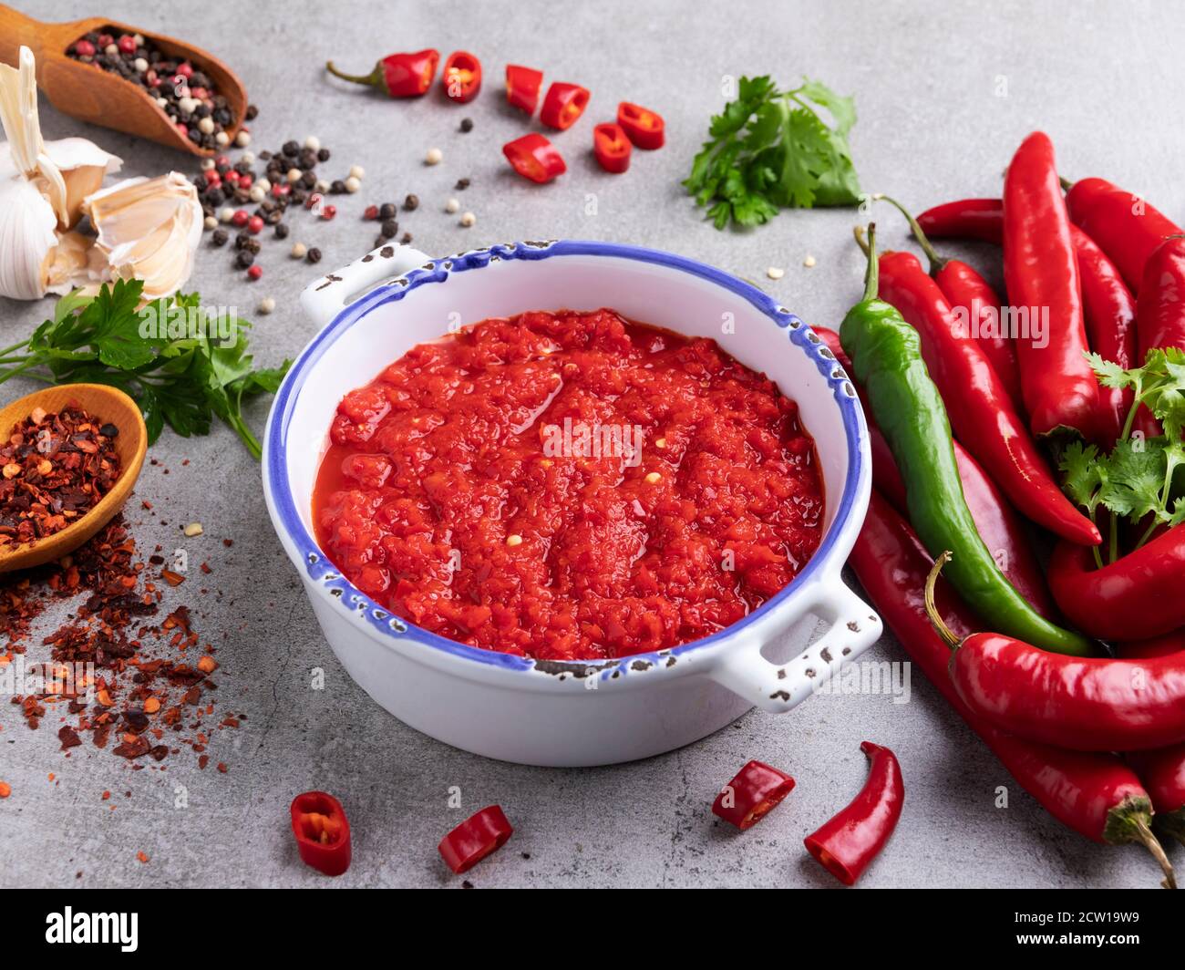 homemade red hot sauce pepper ingredients, spices, close up Stock Photo