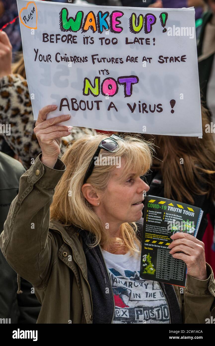 London, UK. 26th Sep, 2020. Covid hoax, get up stand up protest, against vaccinations, 5G and other issues, in Trafalgar Square. Apart from being a hoax the crowd and speakers believe that the virus is a way of controling the masses and taking away their freedoms. Credit: Guy Bell/Alamy Live News Stock Photo
