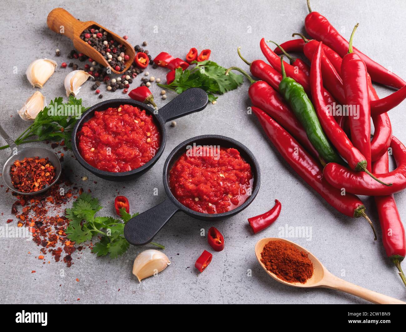 homemade red hot sauce pepper ingredients, spices, close up Stock Photo