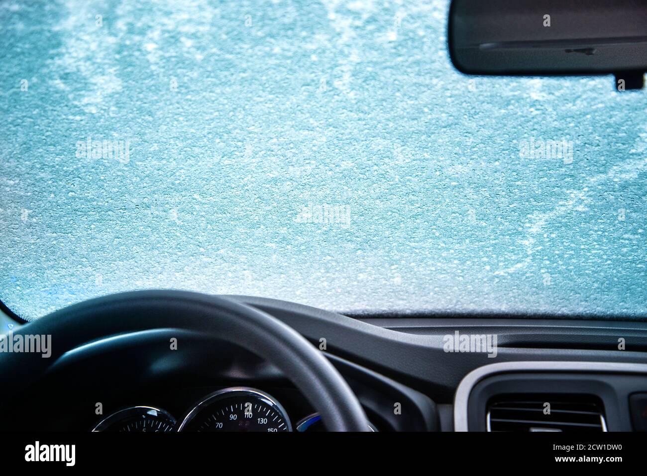 Frozen windshield of the car. Car window under a layer of snow. Internal  view Stock Photo - Alamy