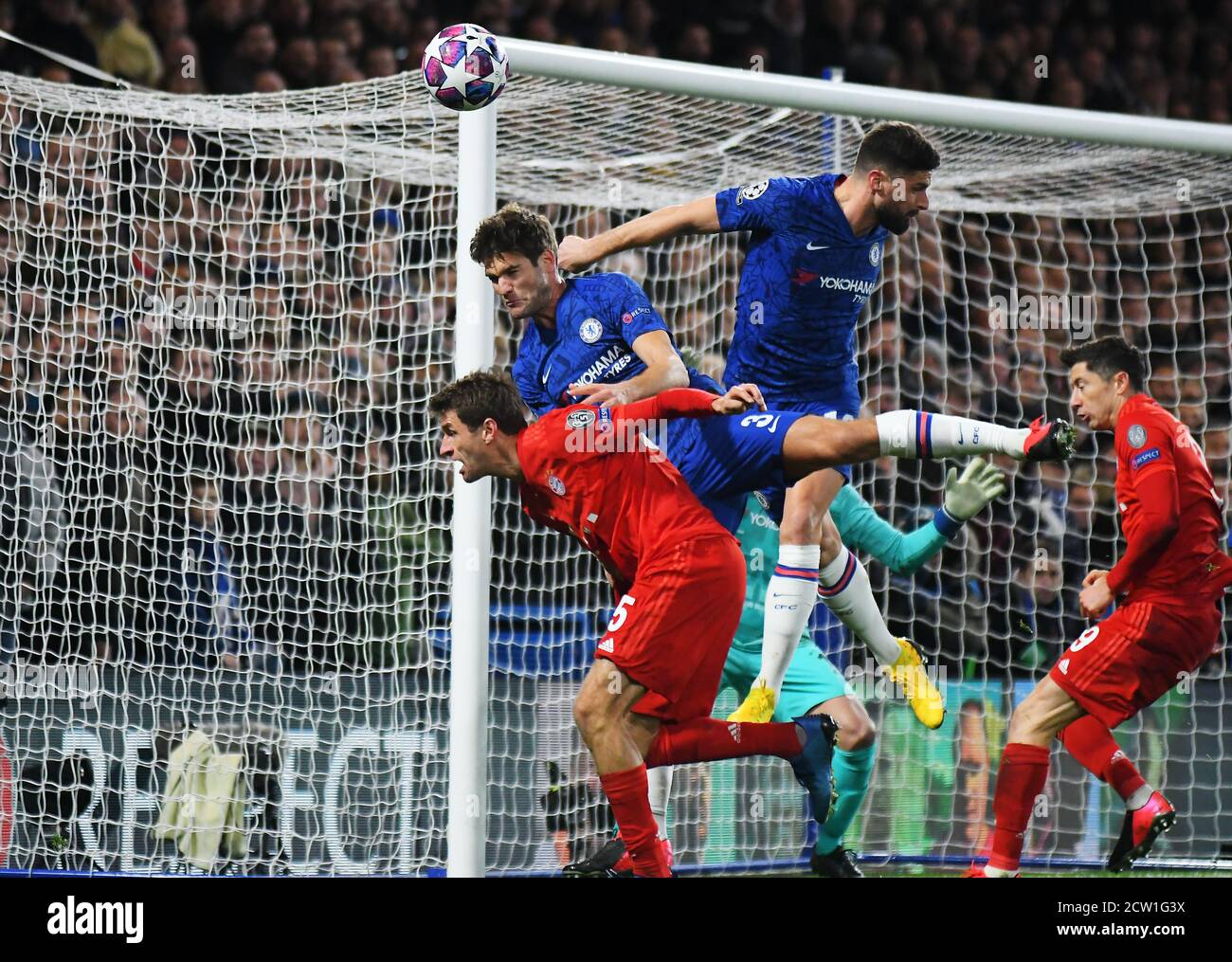 LONDON, ENGLAND - FEBRUARY 26, 2020: Thomas Muller of Bayern, Marcos Alonso of Chelsea, Olivier Giroud of Chelsea and Robert Lewandowski of Bayern pictured during the 2019/20 UEFA Champions League Round of 16 game between Chelsea FC and Bayern Munich at Stamford Bridge. Stock Photo