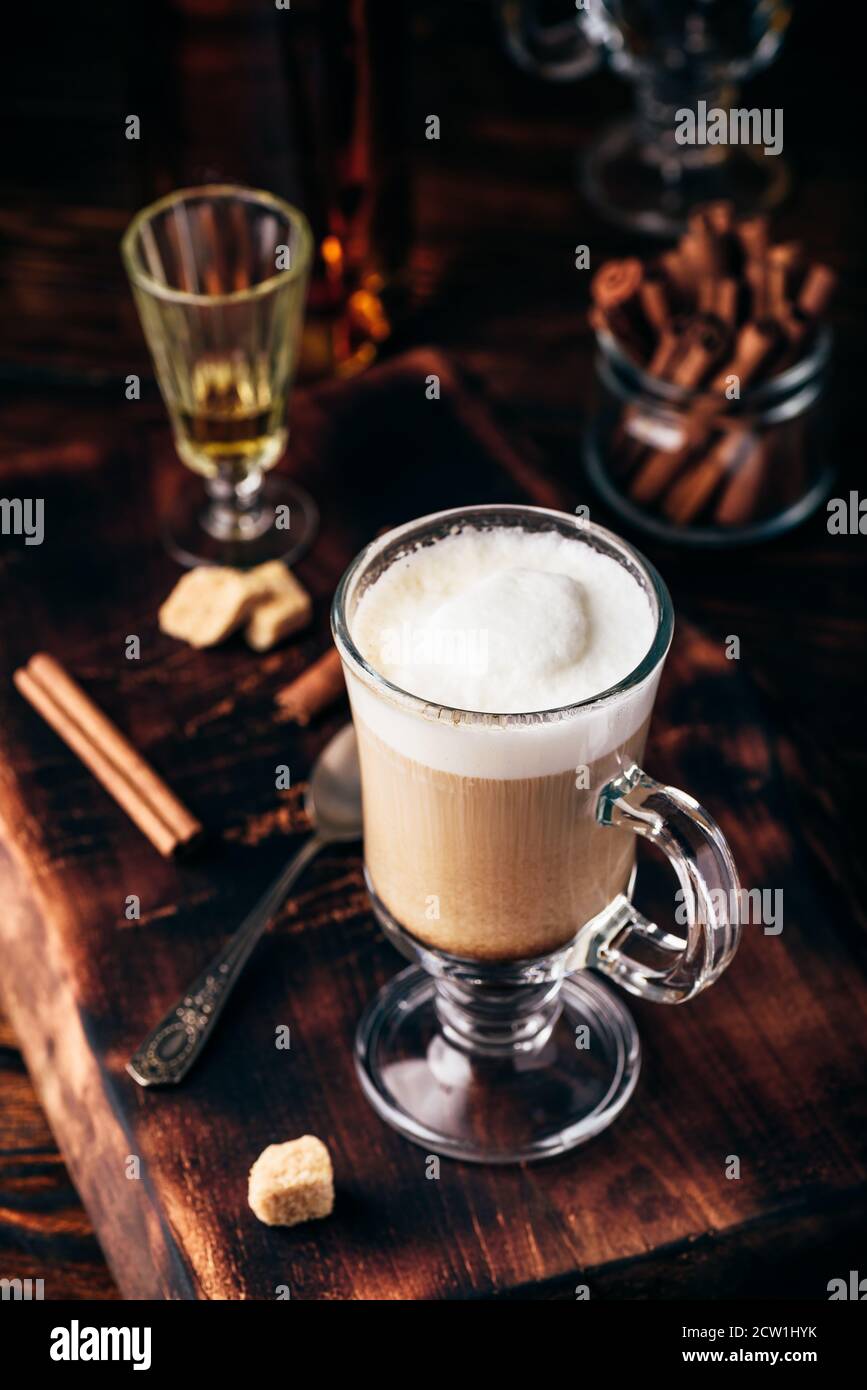 Coffee with Irish whiskey and whipped cream in glass Stock Photo Alamy