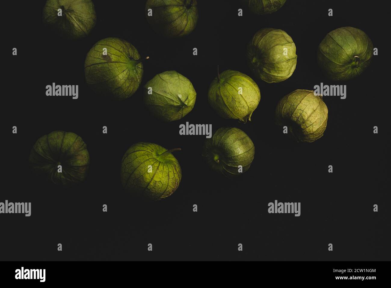Macro close up portrait of tomatillo, Mexican husk tomato, selective focus Stock Photo